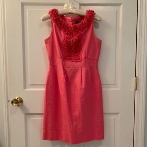 Pink sleeveless dress with ruffle details